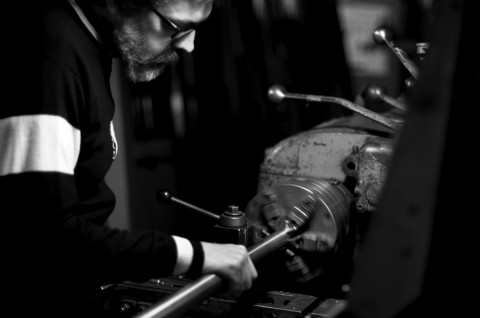 Seven Mike Salvatore at cutoff lathe - photo - Kirk Tegelaar
