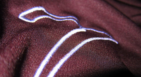 Seven logo on Rapha jersey